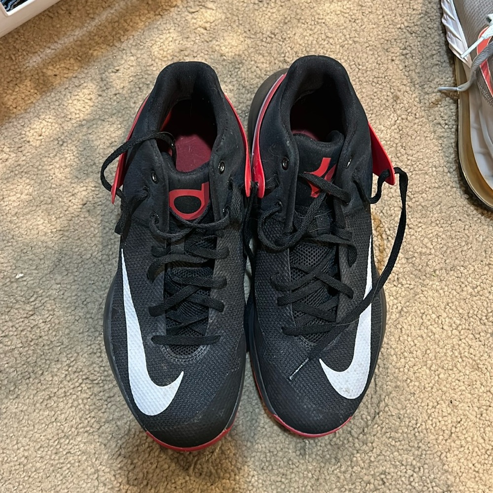 Red and black Nike